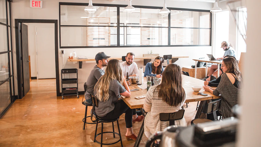 Colleagues in a working discussion around a table